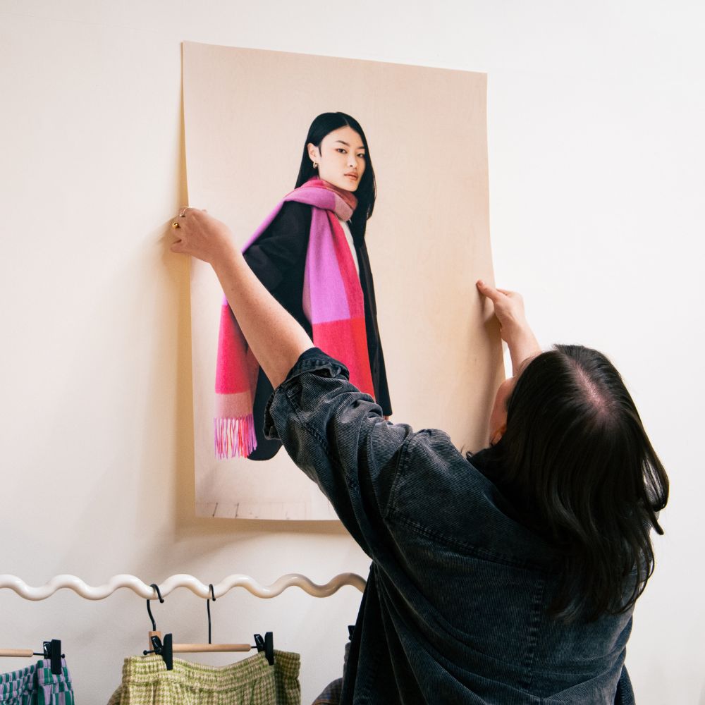 An indoor poster of a model